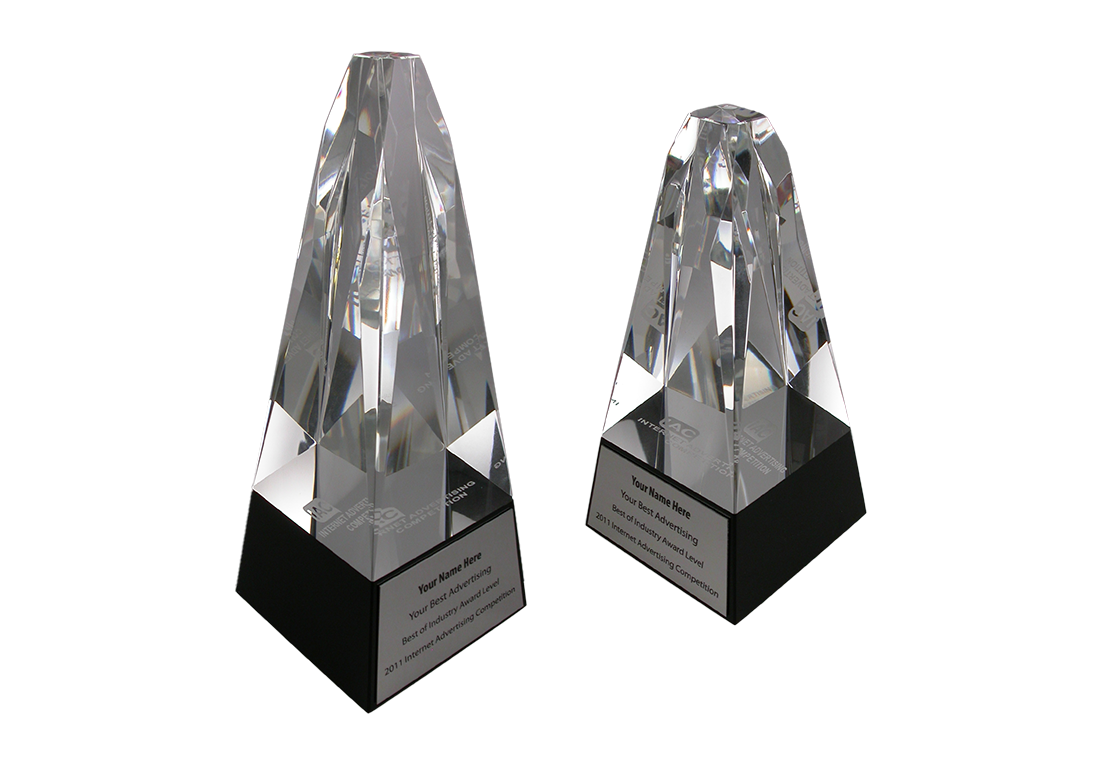 Small and large geometric crystal domes atop a black base | Society Awards
